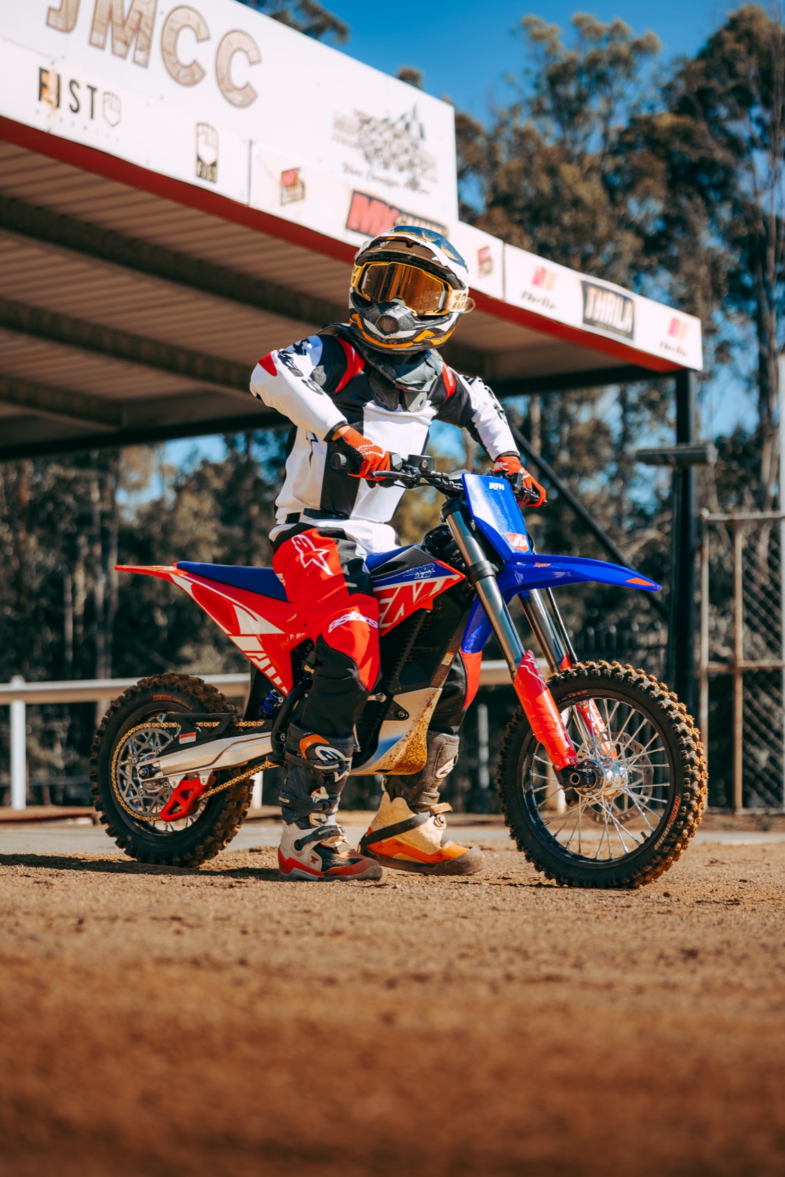 Youth rider training on an RFN electric dirt bike for kids and junior tracks