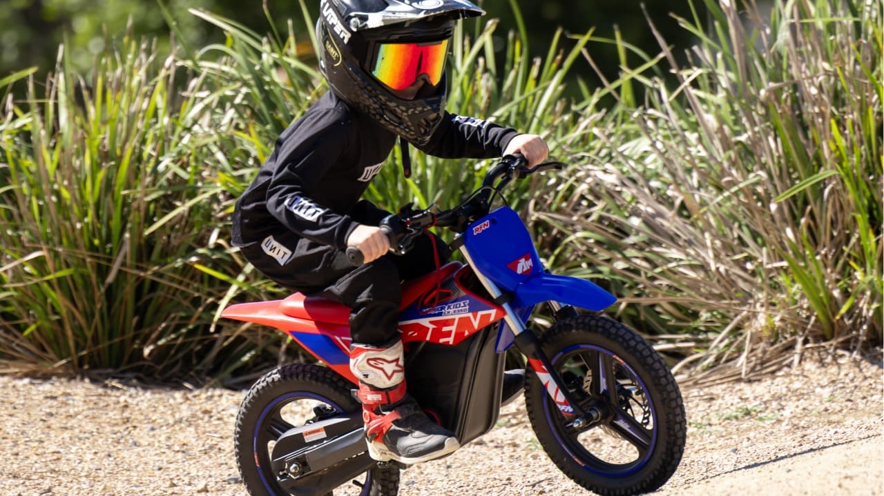 A kid riding Apollino dirt bike